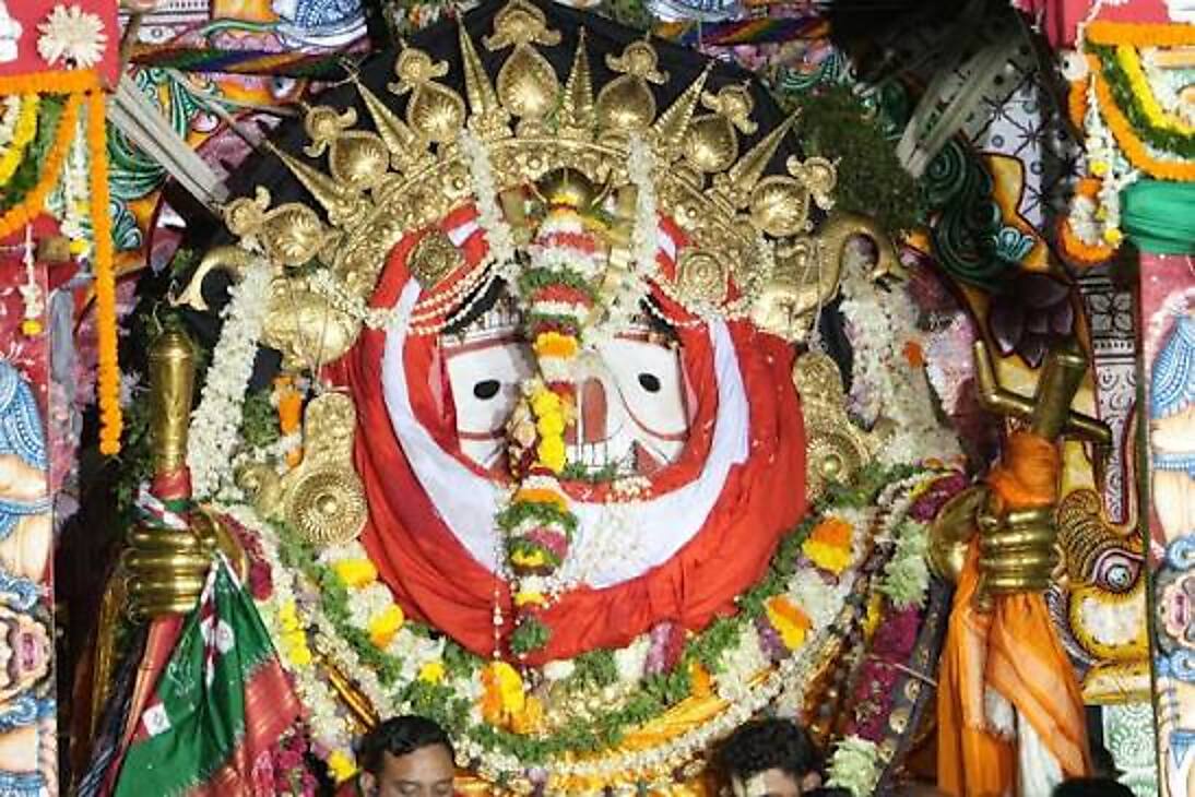 Lord Jagannath and the sacred siblings seated upon the chariots at Puri